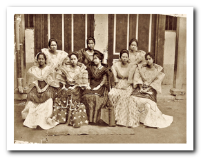 A group of filipinas sitting together in old picture