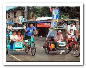 two peddle carts on the street